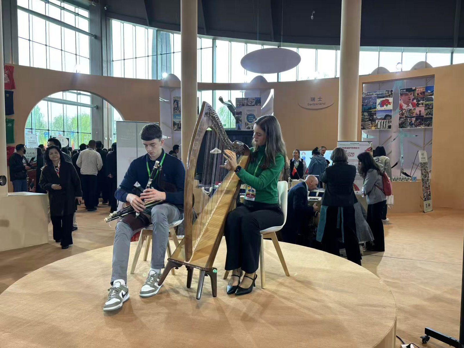 Audience members engaging closely with the Irish cultural exchange activity