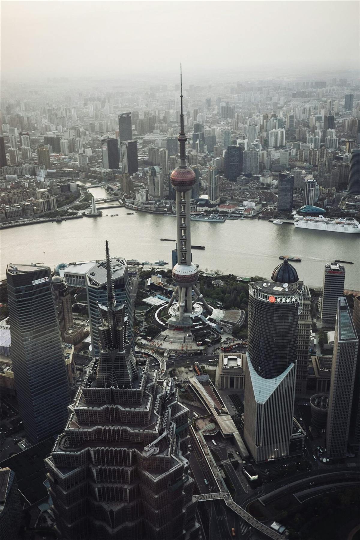 Daytime Shanghai skyscrapers and modern city street scene.